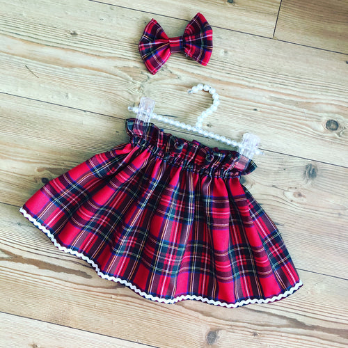 Red tartan skirt with matching hair bow